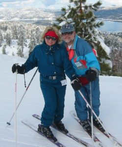 Deena Solomon with her husband Paul, skiing